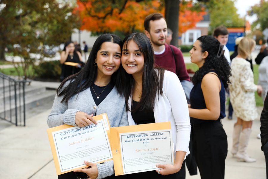 Bishruti Rijal &rsquo;26 and Saleha Iftikhar &rsquo;26 celebrate their academic recognitions during Fall Honors Day in October 2025.
