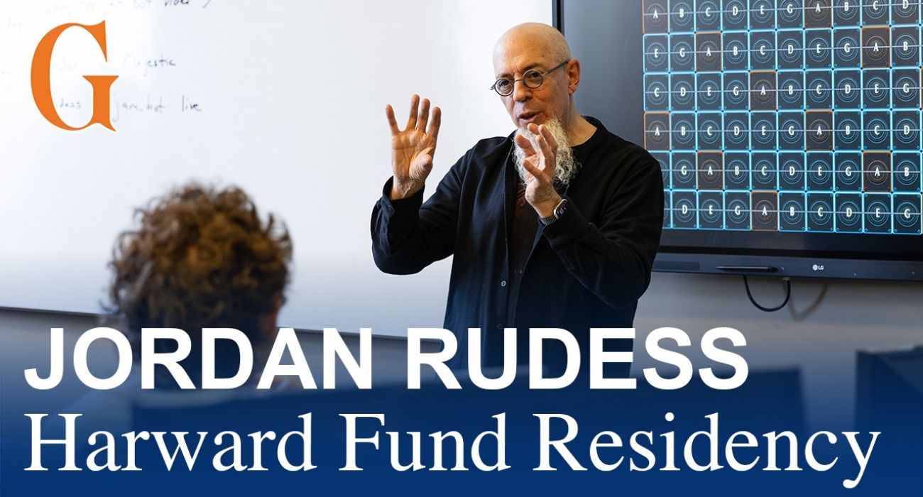 Jordan Rudess speaking to a group of students