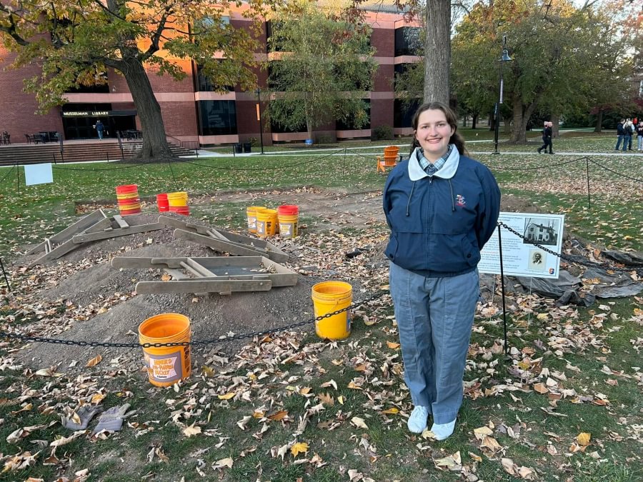 Julia Ciccone '28 stands in front of an archaeological excavation site during her Fall 2024 anthropology course.