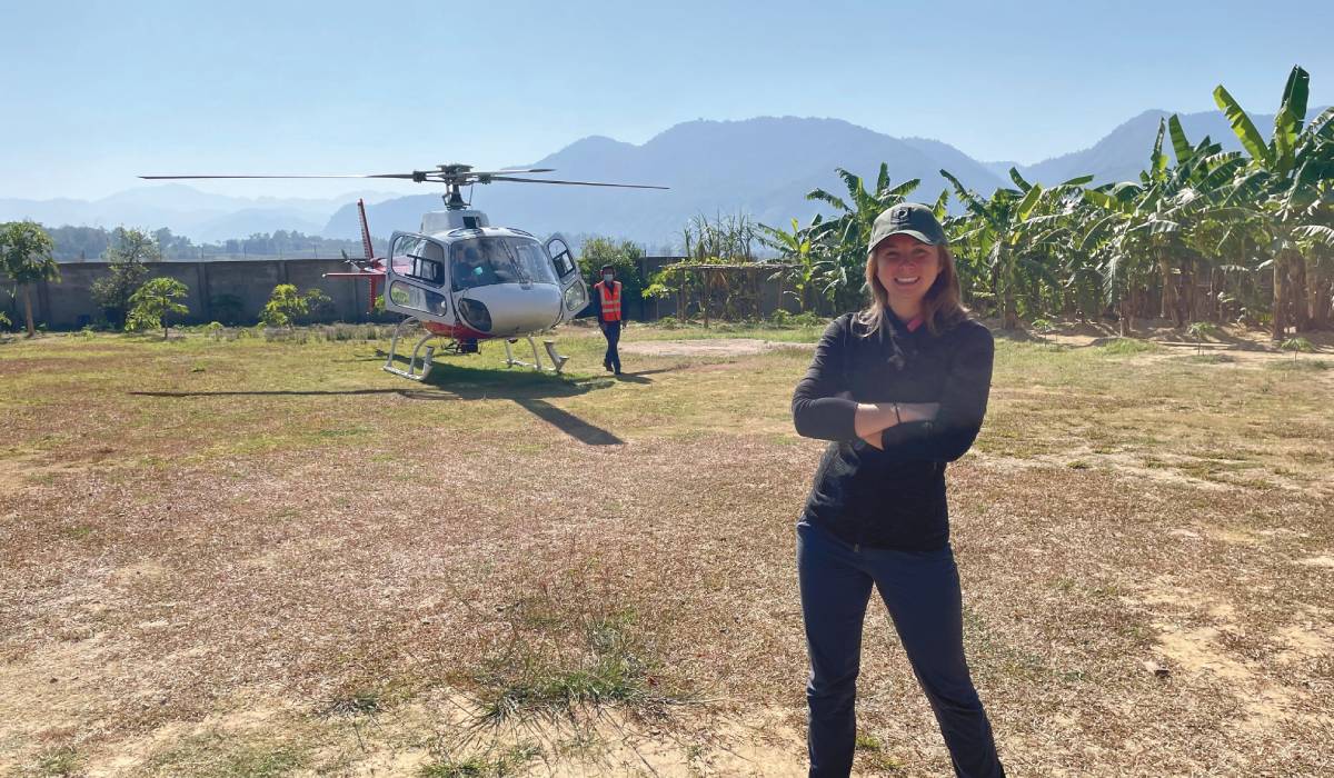 Katherine M. (Haas) Pompeani ’10 uses a helicopter to support DPAA recovery operations in Laos.
