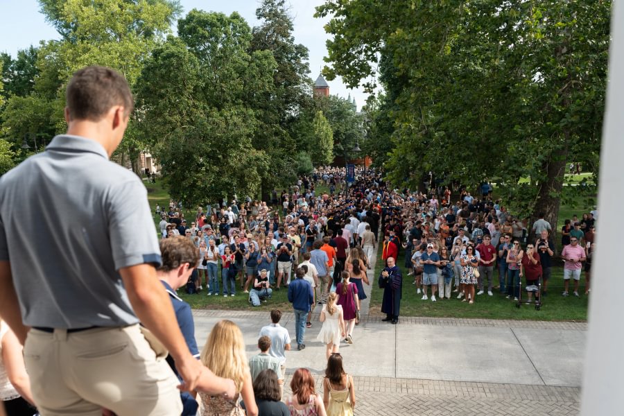  The Class of 2030 walks down the south steps of Pennsylvania Hall.
