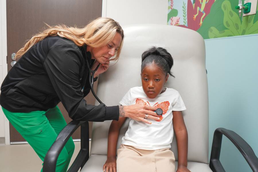 A doctor checking out a patient
