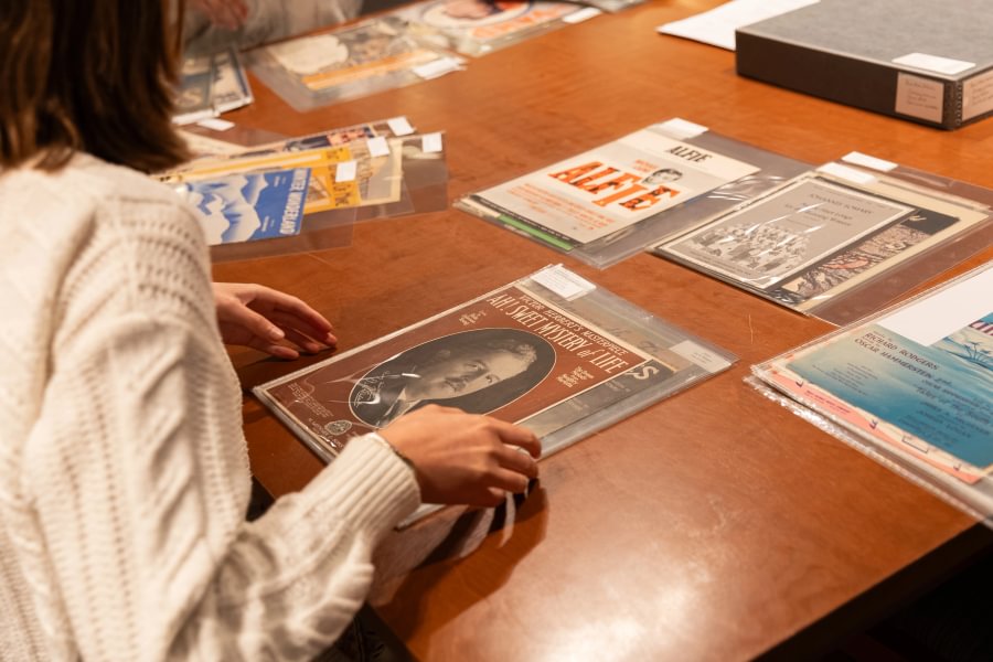 Zee Dawson &rsquo;29 examines a music score for Victor Herbert&rsquo;s &ldquo;Ah! Sweet Mystery of Life.&rdquo;