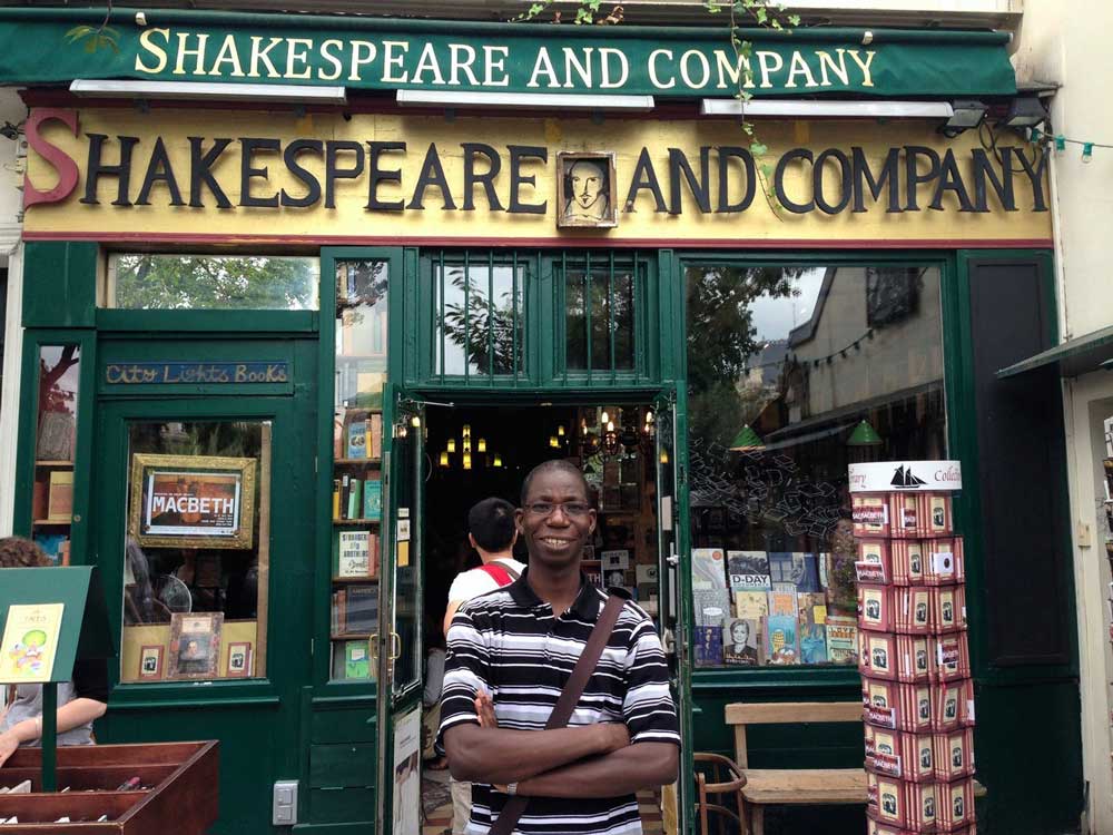 Professor Abou Bamba outside Shakespeare & Co. in France