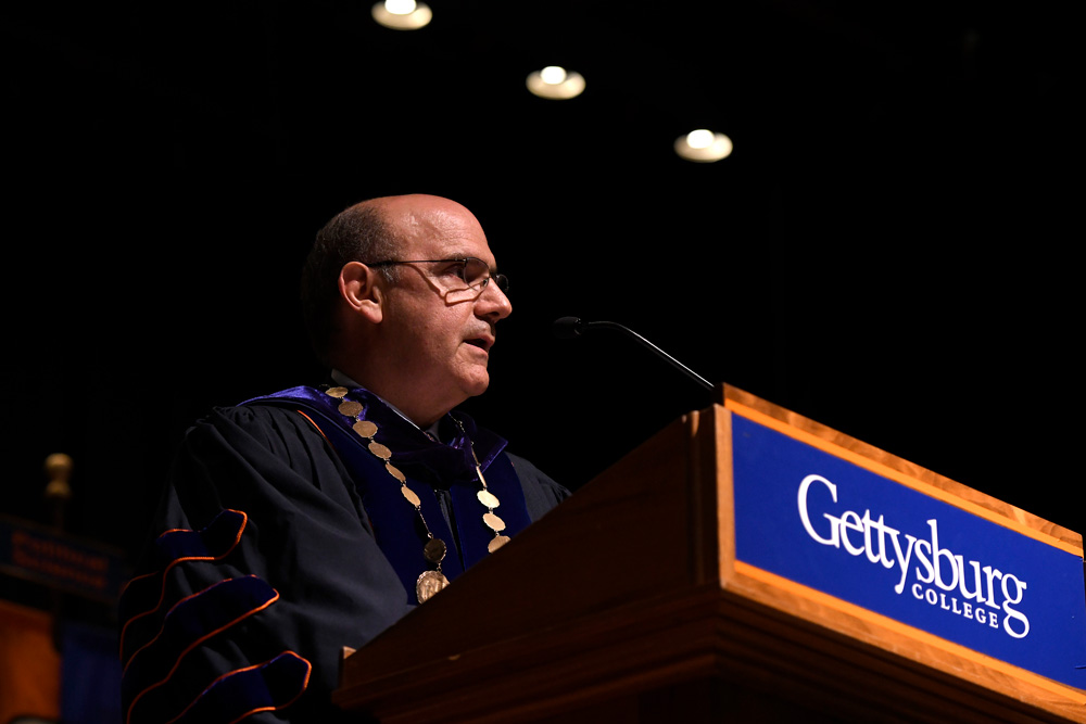 President Bob Iuliano at a midyear graduation ceremony