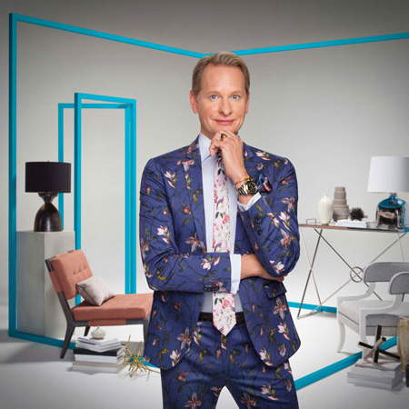 Carson Kressley in a room with furniture