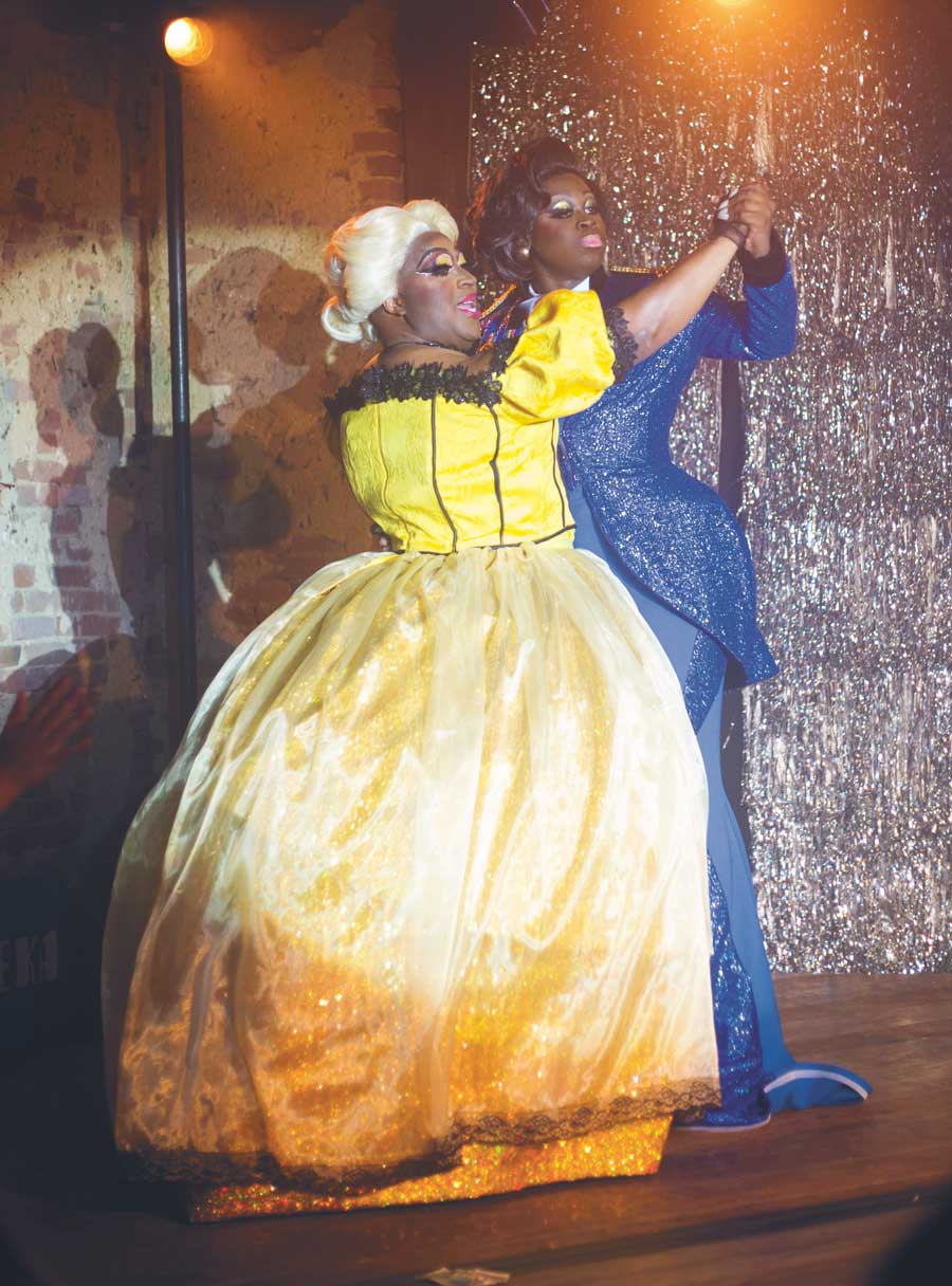 Darryl Jones dressed in drag dancing with Bob the drag queen