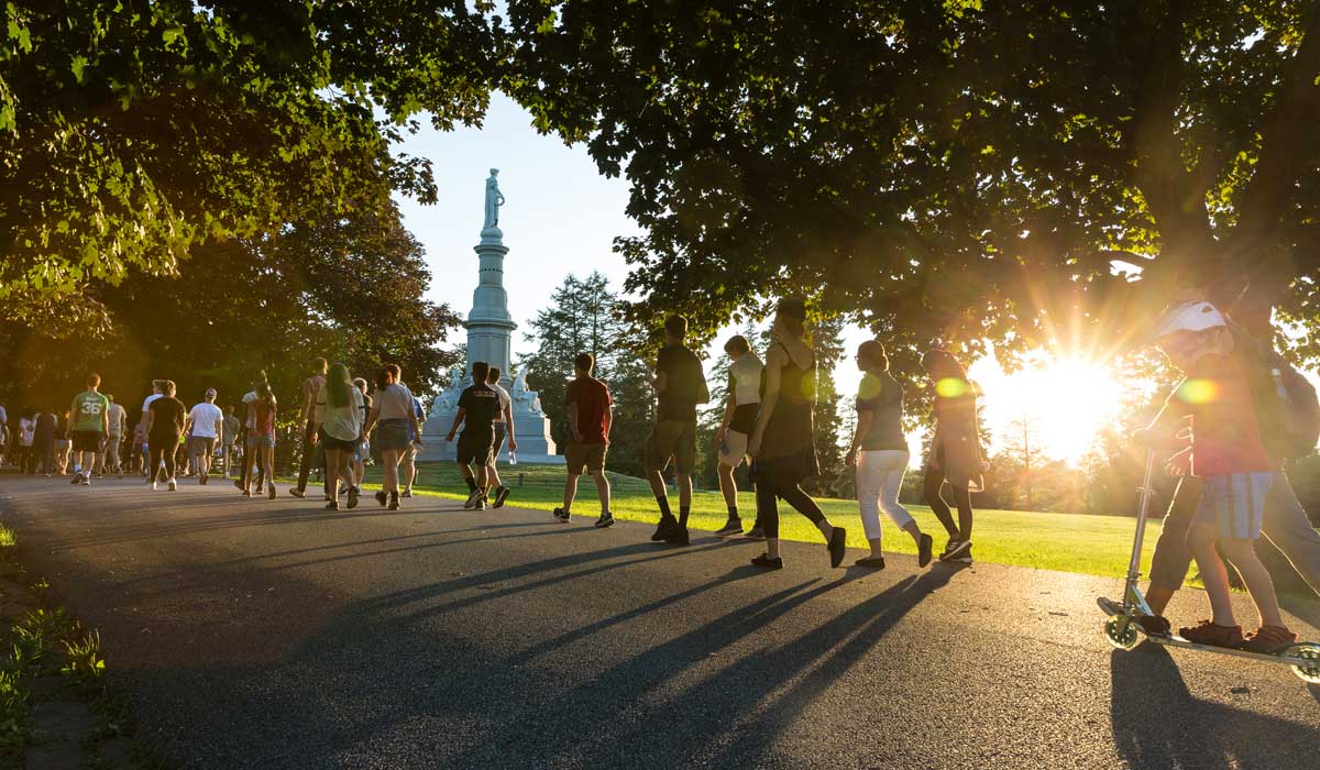 Students on the First Year Walk walking through Soldiers National Cemetery