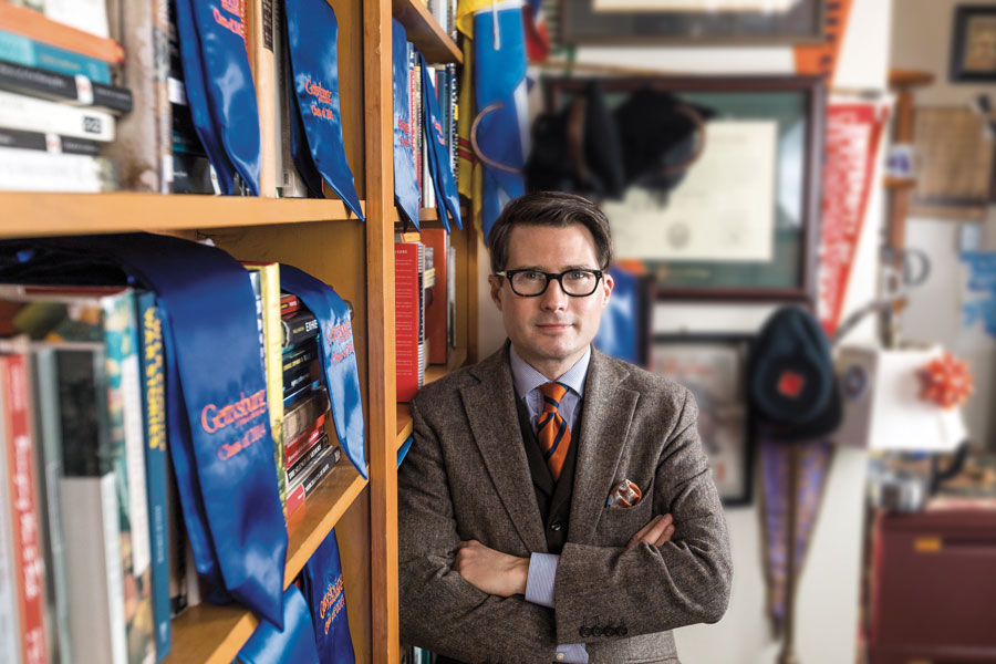 History and Interdisciplinary Studies Prof. Ian Isherwood '00 with his stole of gratitude