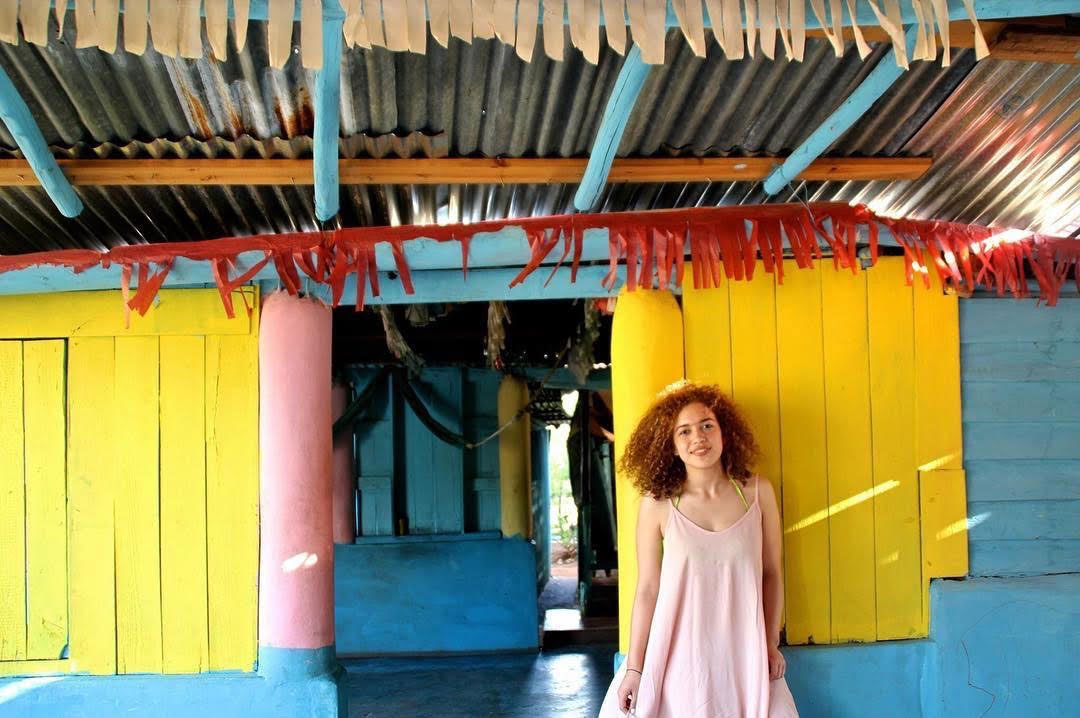 Flores inside of a colorful house in the Dominican Republic