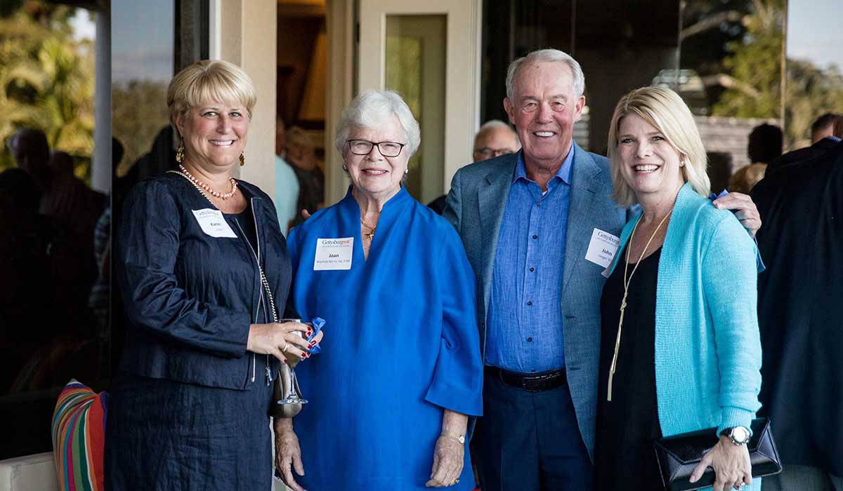 Karen (left) and John Jaeger and friends