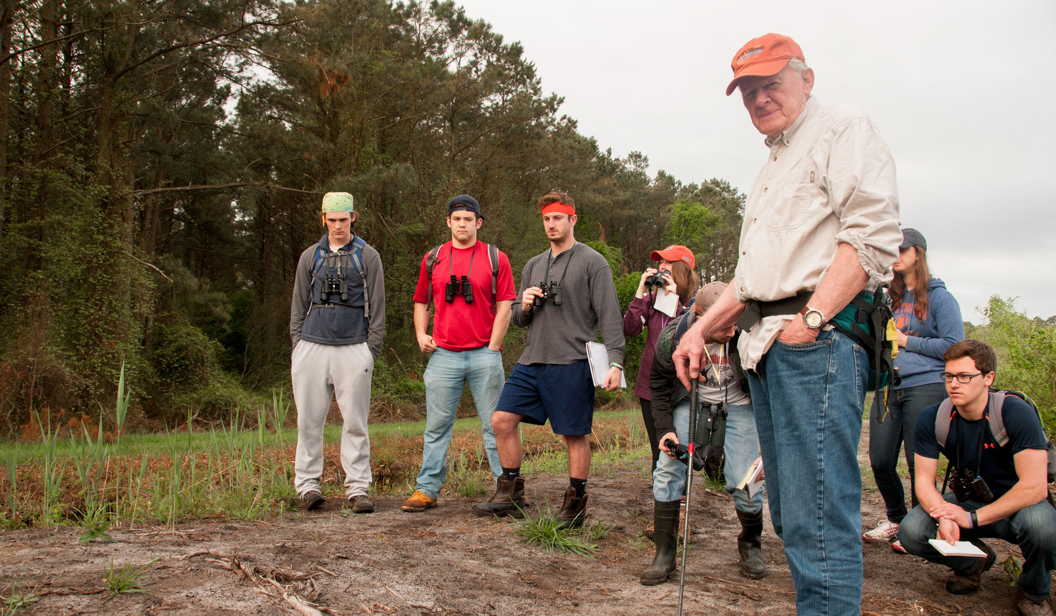 John Winkelmann conducting field research with students