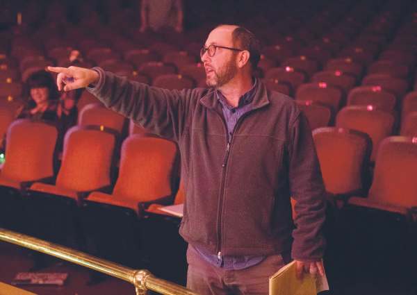 Photograph of Kauffman directing