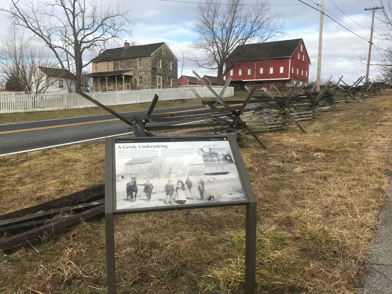 Picture of a wayfinding sign outside the home of Basil Biggs