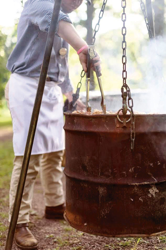 Roby cooking on the original firepit barrel