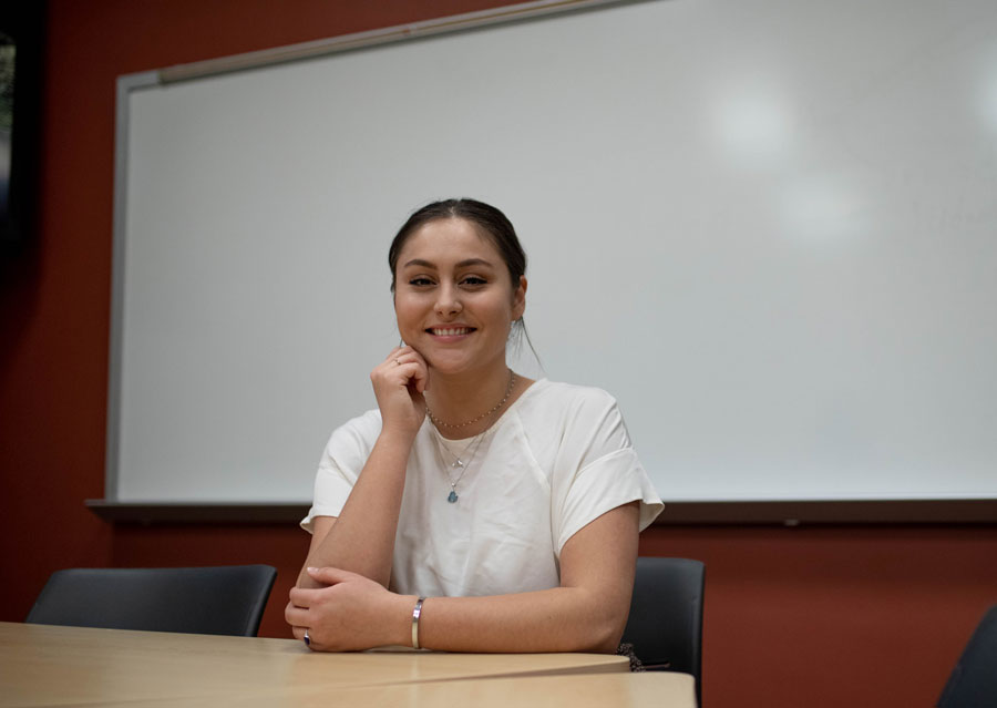 Sierra Conboy sitting in a classroom