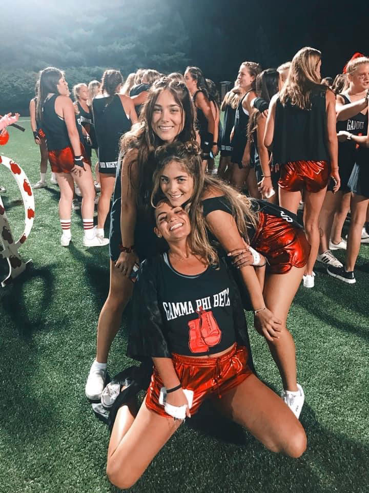 Taylor and Madison with sorority sisters at an outdoor event