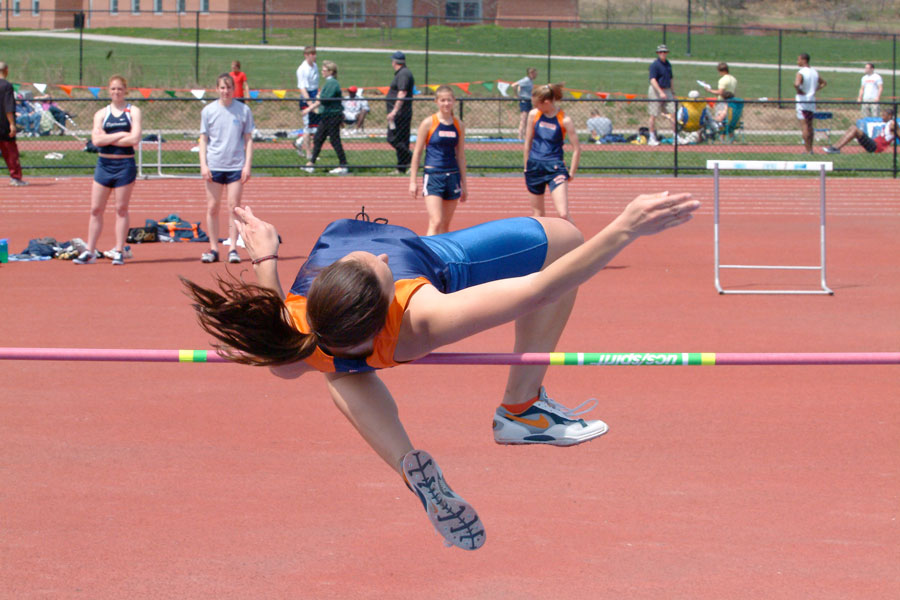 Susan Buckwalter performing a high jump at Gettysburg College