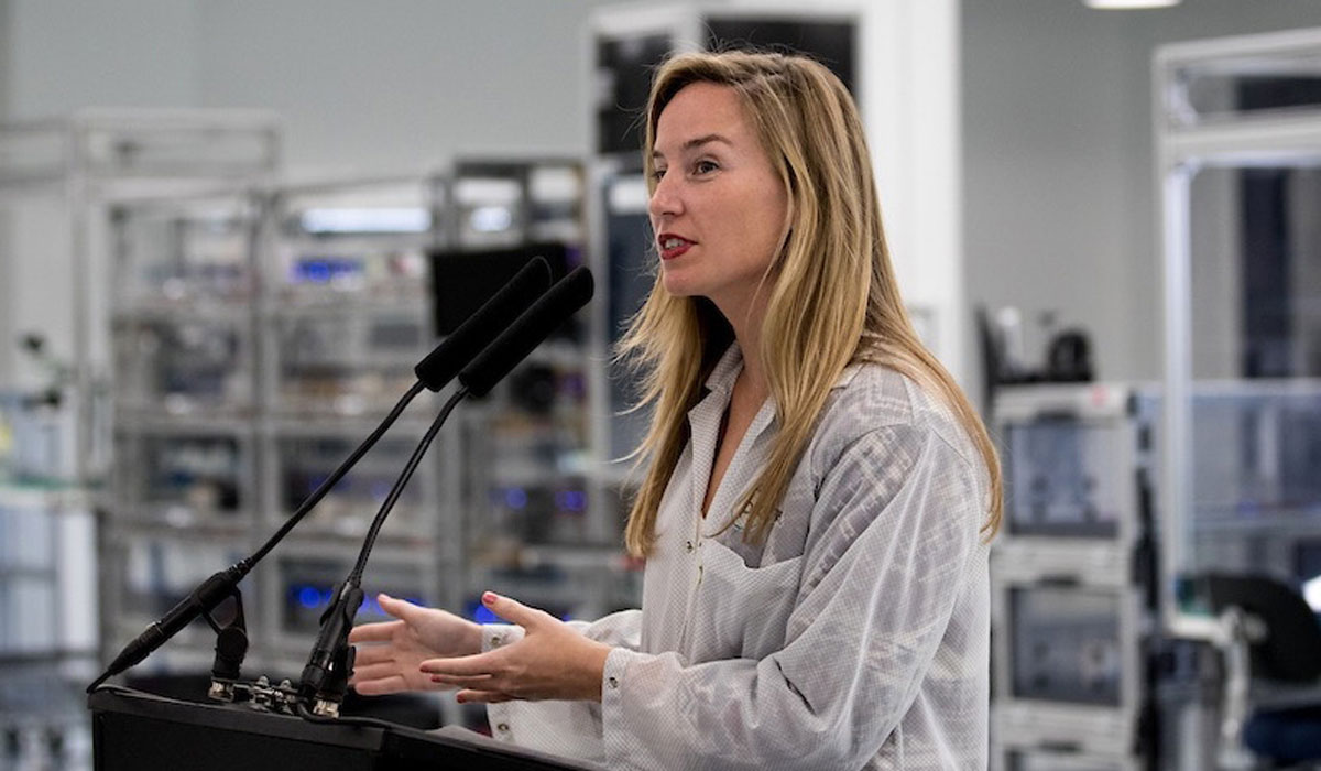 Tara O'Shea speaking at a podium