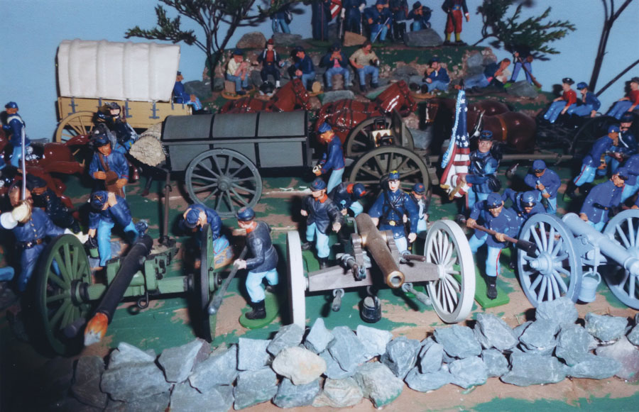 Toy civil war soldiers staged in a battle scene