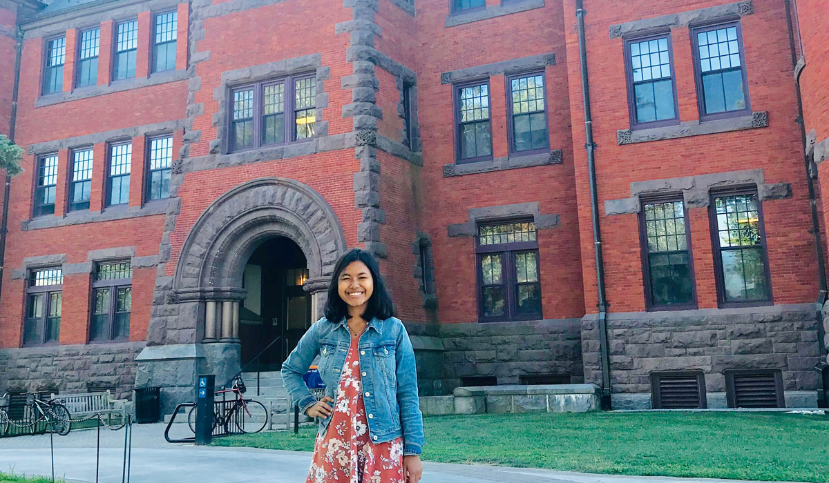 Srey Nich Vunn '22 poses for a picture in front of Glatfelter Hall at Gettysburg College.