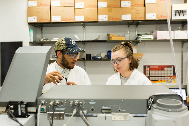 Alex and Olivia working in the lab