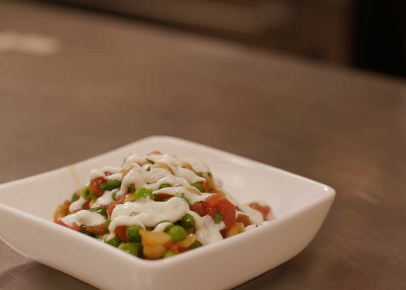 Curried chickpeas in a white bowl