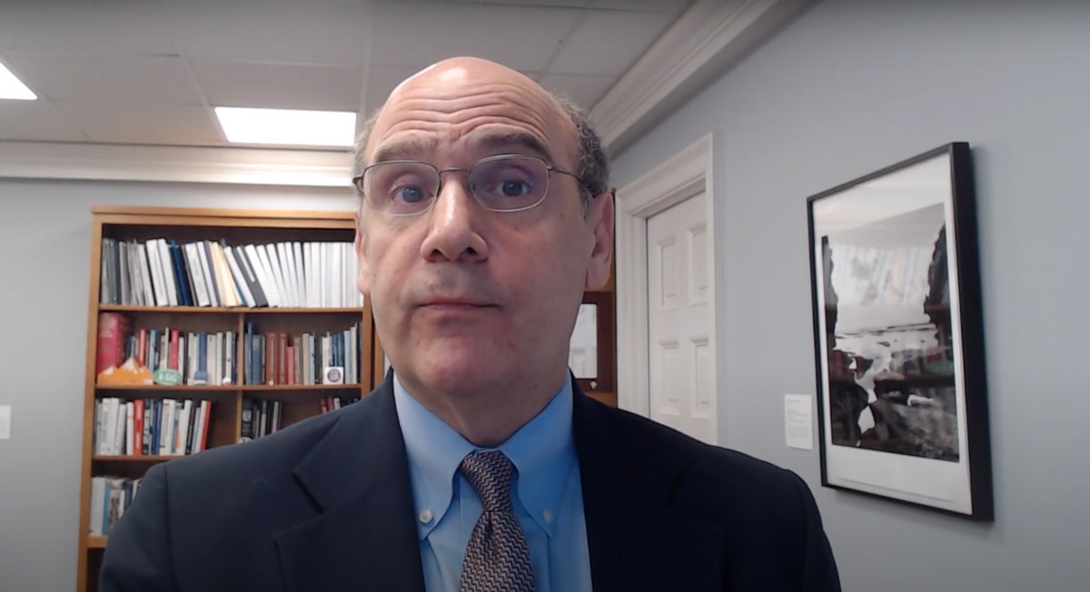 President Bob Iuliano speaking inside of his office