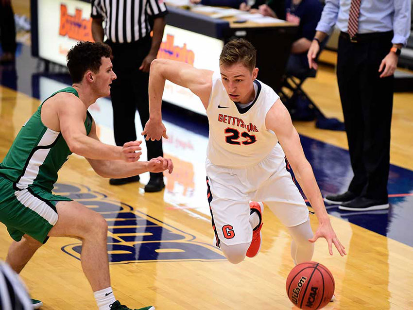 Student playing basketball