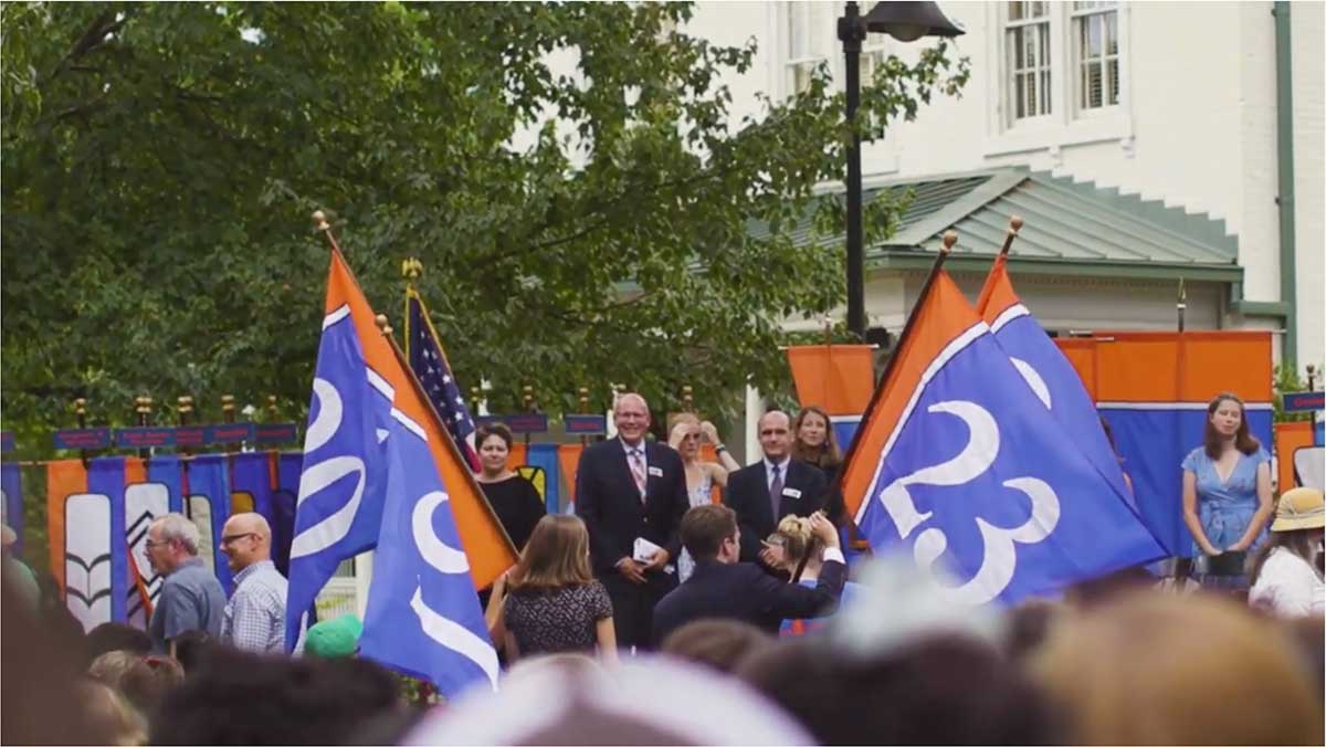 Class of 2023 flags and President Iuliano at Convocation