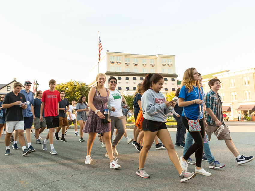 Students in the center of town on the First-Year Walk