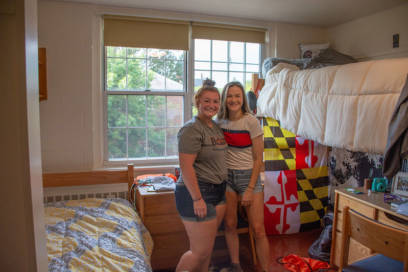 Two students in a dorm room