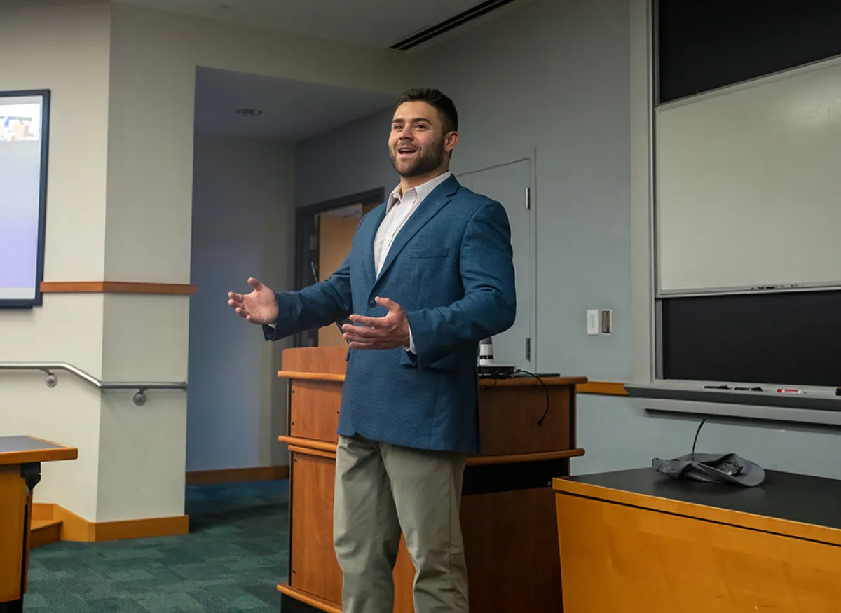 Justin Titchenell speaking to class