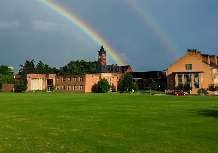 A double rainbow across the sky behind Memorial Field.
