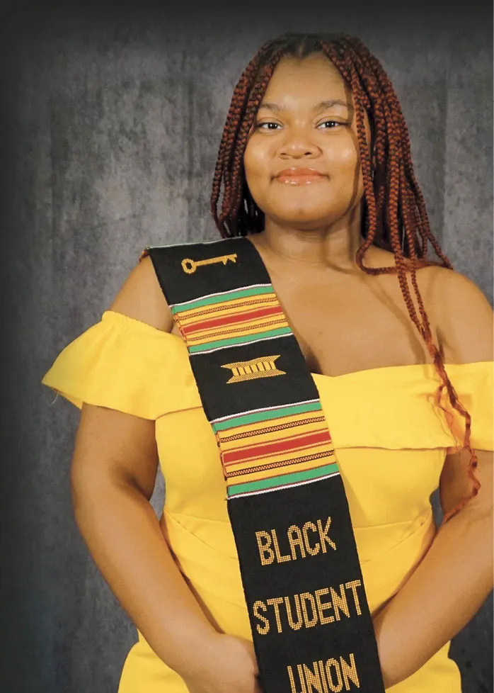 Britney Brunache wearing a BSU stole