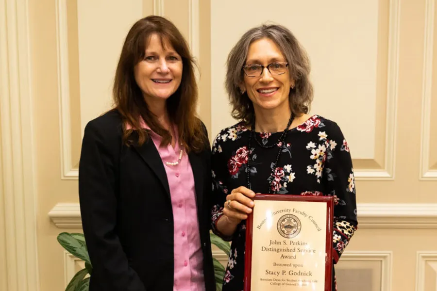 A photo of Godnick with the 2023 John F. Perkins Award