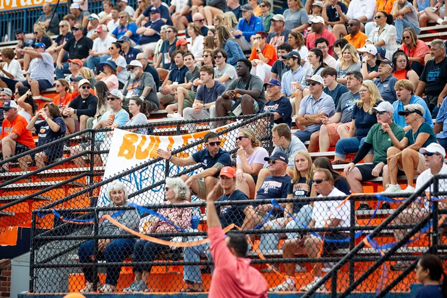 Fans cheer on the football team in their game against Christopher Newport.