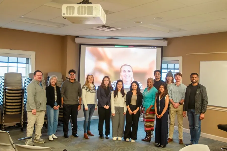Gettysburg students pose with local business leaders after their final presentations in the Building America program.