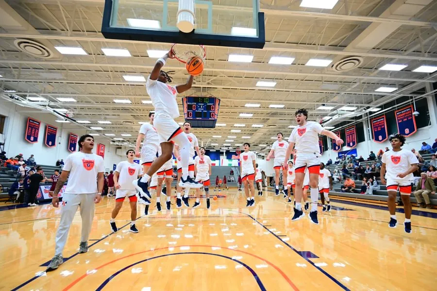 Centennial Conference Defensive Player of the Year Jordan Stafford ’25 playing basketball