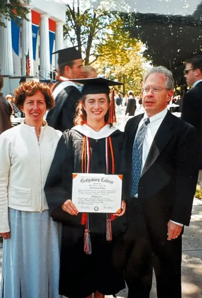 Garcia (center) with her parents at her graduation from Gettysburg in 2002.