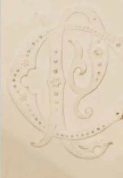 PC monogram in orange and blue