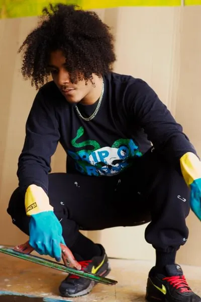 King David (David Rampersad Jr. ’17) displays abstract art at Welancora Gallery in Brooklyn, New York.