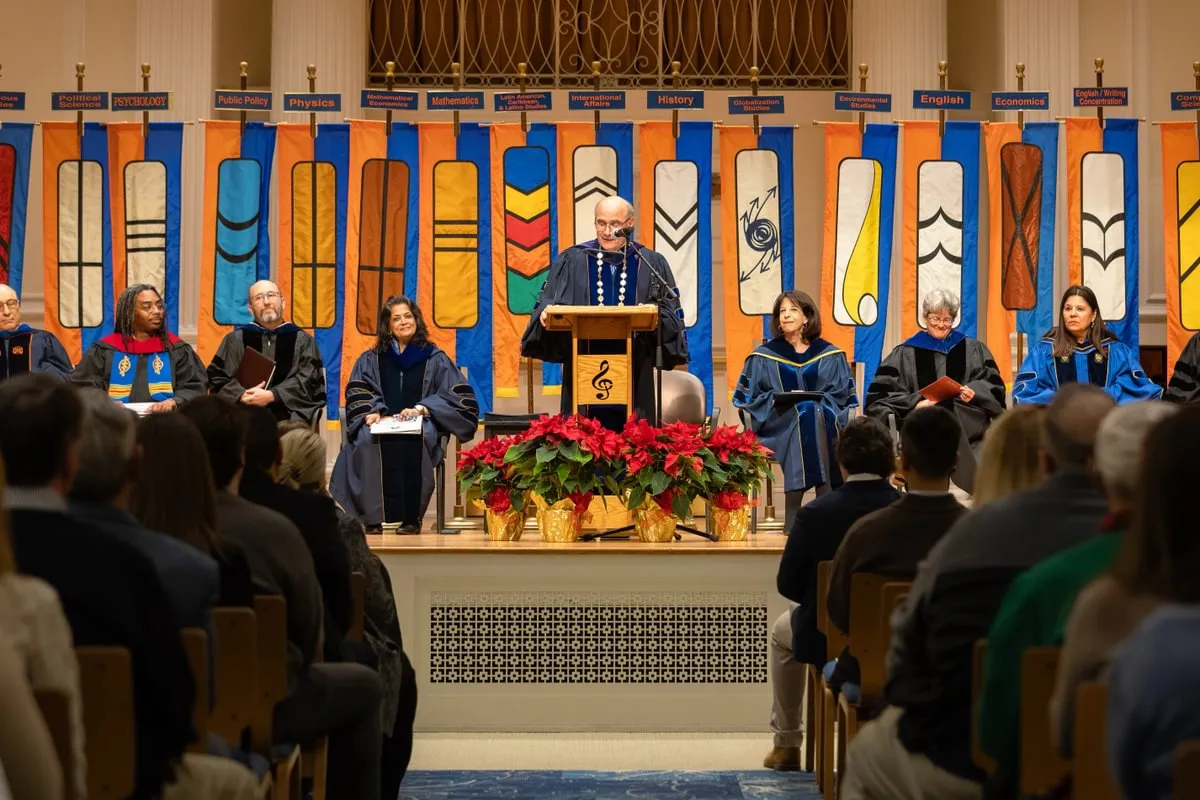 view of podium from center aisle at midyear commencement
