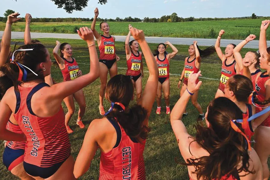 Gettysburg’s cross country student-athletes rally before competition.