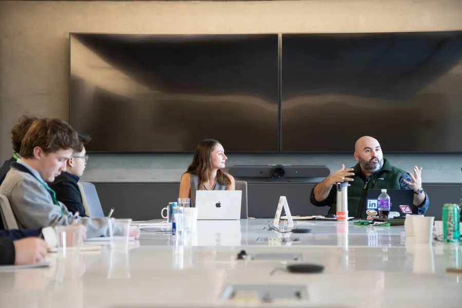 Conor Barry ’16 (right) of LinkedIn hosting Gettysburg students in New York and leading a virtual session for alumni.