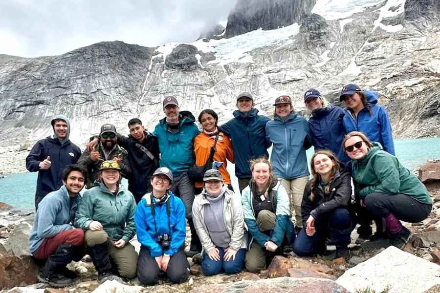 Gettysburg students and staff perch below the Towers of Avellano in Chile, reflecting on leadership, adaptability, and the local gaucho culture.