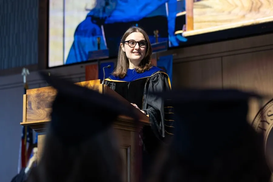 Spanish Prof. Radost Rangelova addresses the women’s lacrosse seniors during Special Commencement.