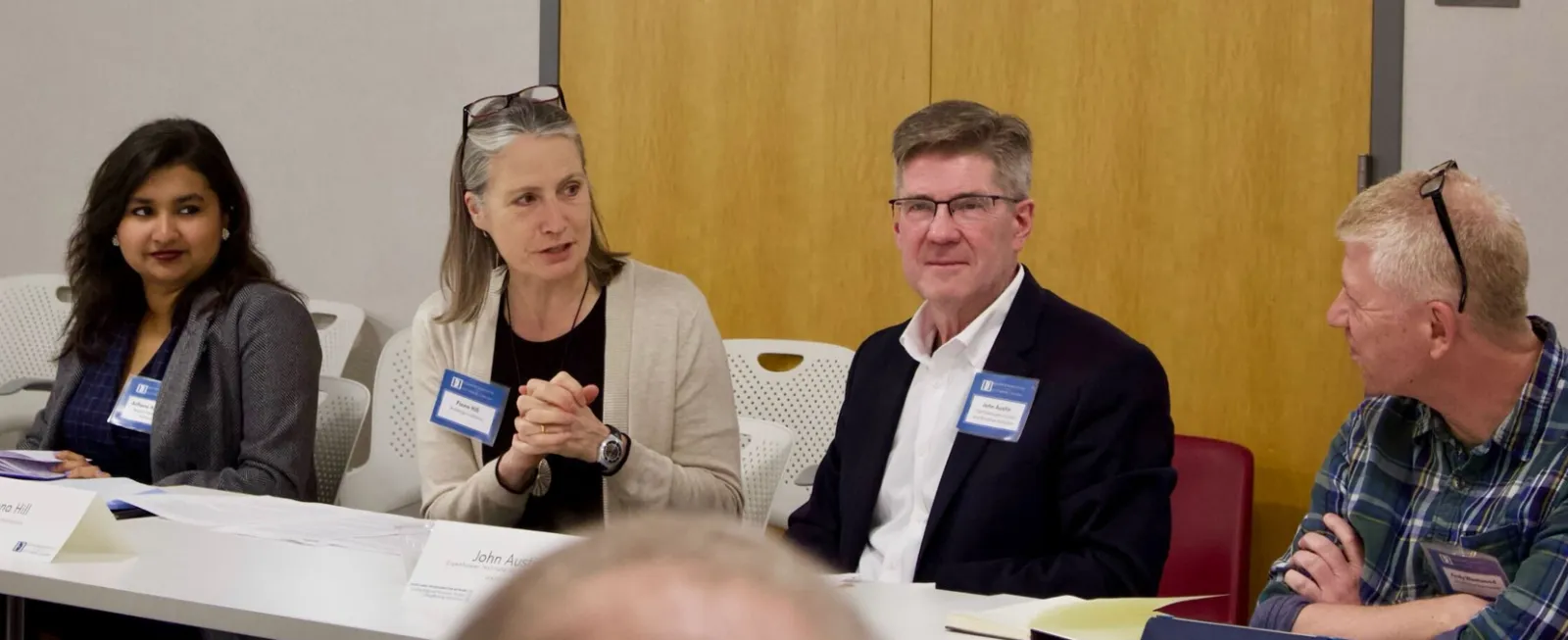 A panel leads a discussion.