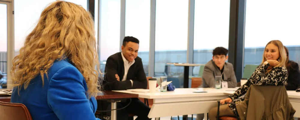 Students engaging with a guest speaker.