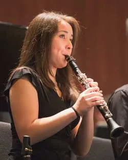 Musician plays the clarinet